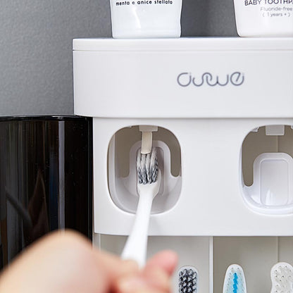 Hanging squeezer toothbrush